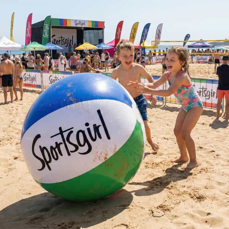 Kids playing with inflatable beach ball