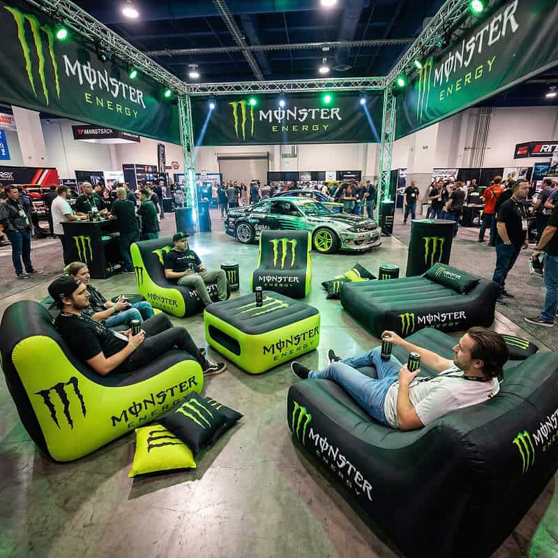 Men sitting on inflatable furniture